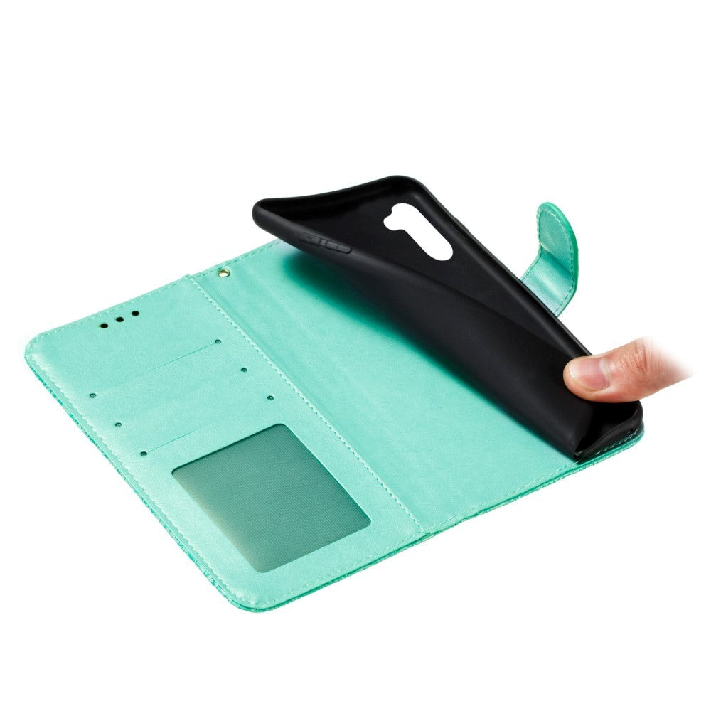 Samsung Galaxy M11 Floral Lace Leather Flip Cover m. Lommebok - Turkis