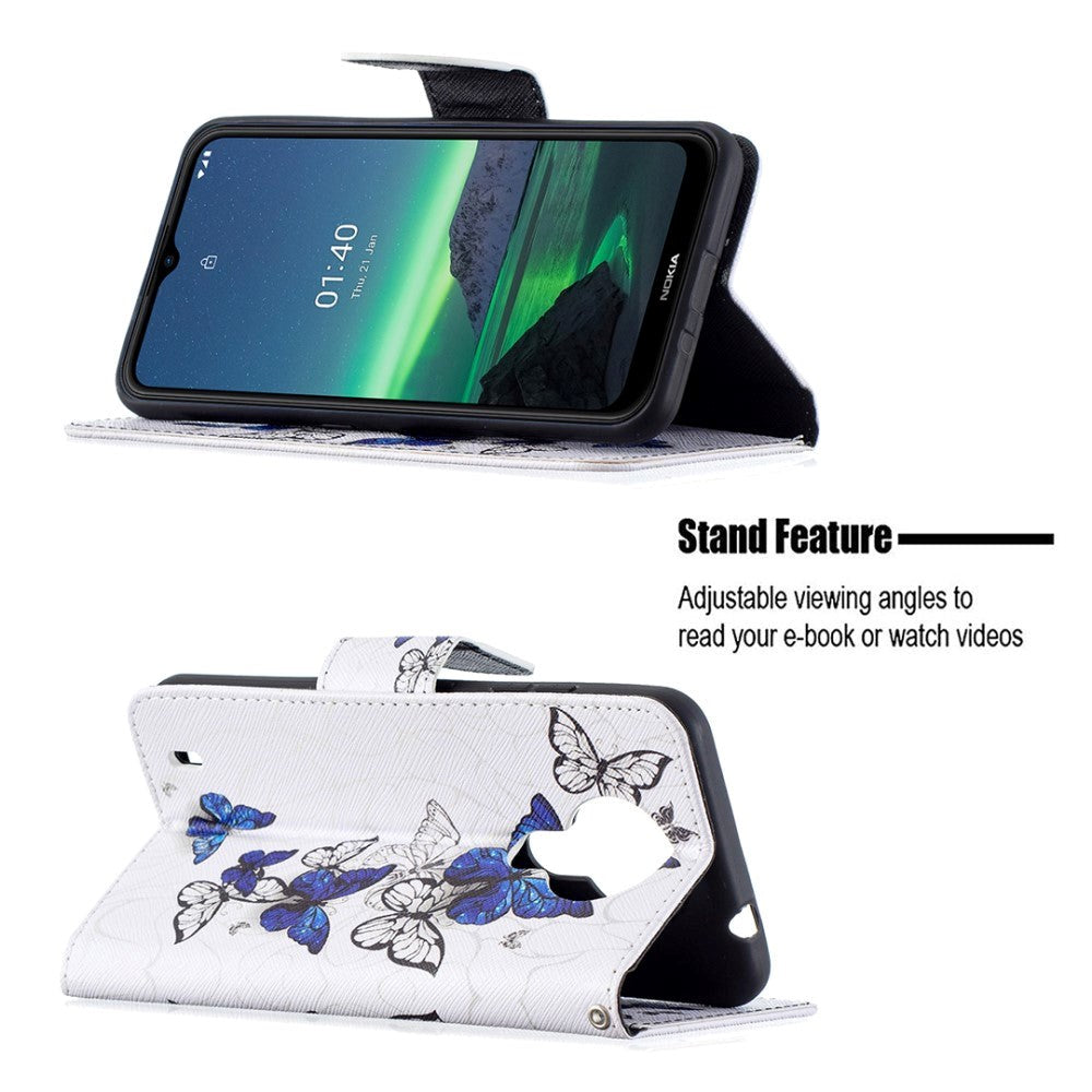 Nokia 1.4 skinndeksel m. Lommebok - blå og hvite sommerfugler