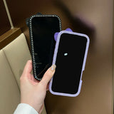 EIDERWOOD iPhone 16 Hybrid Bagside Cover m. 3D Sløjfe og Rhinsten - Gennemsigtig / Hvid