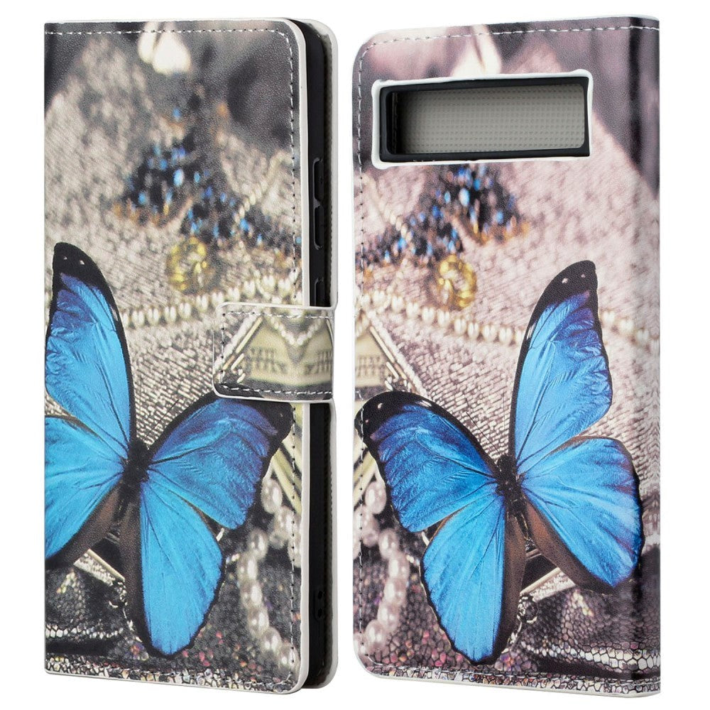 Google Pixel 7A Læder Flip Cover m. Pung & Ståfunktion - Blå Sommerfugl