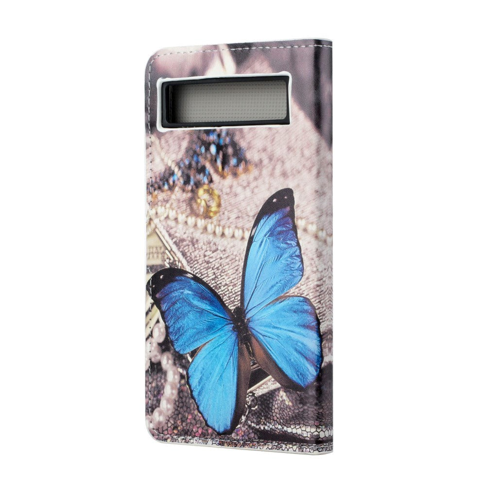 Google Pixel 7A Læder Flip Cover m. Pung & Ståfunktion - Blå Sommerfugl
