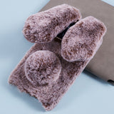 iPhone 15 Pro fleksibelt plastdeksel m. Pels - Kaninører - Brun