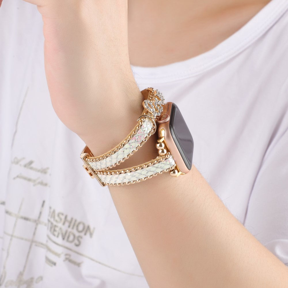 Apple Watch (38/40/SE/41/42 mm) Klokkereim i metall og lær m. Rhinestone - Gull / Hvit